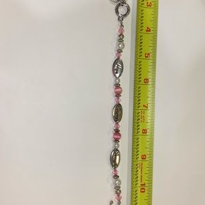 Breast cancer awareness bracelet.